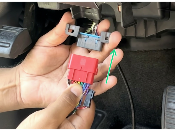 Attach the male end of the T-harness to the factory diagnostic port.