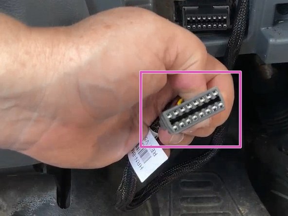 Plug device into remaining end of T-harness