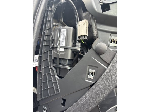 Route the harness up to the A-pillar middle panel side.