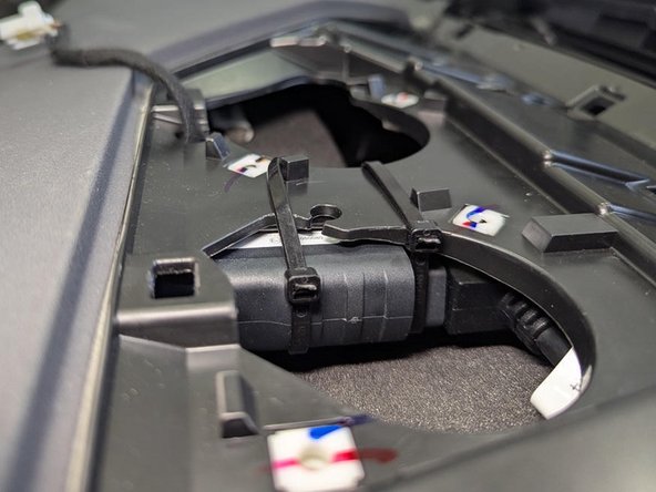 Mount the GO9 device to the bottom of the dash bracket as shown with at least 2 cable ties.