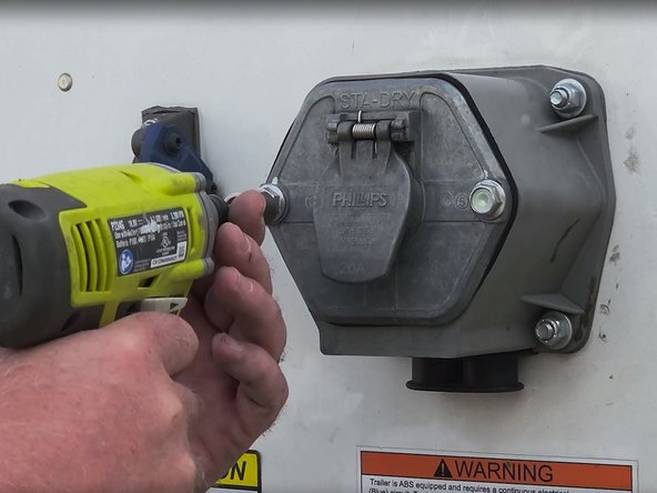 Remove the bolts that secure the nose box connector plate to the housing and then carefully pull the nose box connector plate away from the housing.