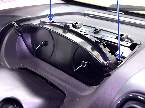 Remove the instrument panel cover by pulling up.