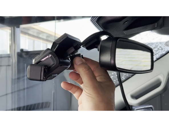 Place the cable guard on the camera and secure it using the Allen key.