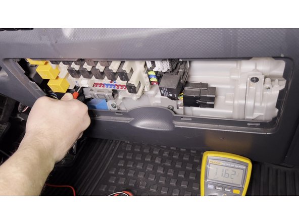 Using a multimeter, identify the constant battery power (B+) fuse slot and the ignition (ACC) fuse slot.