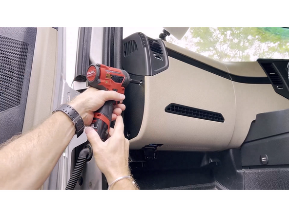 Start removing the dash panels required to access the vehicle’s diagnostic port. Take care not to damage any plastic clips or misplace any screws.