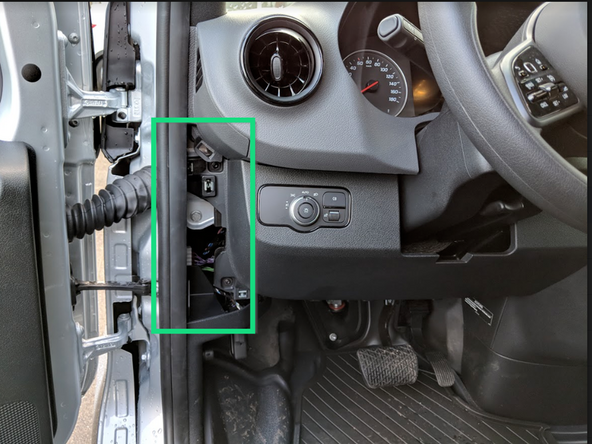 Unclip and remove the panel from the side of the dashboard.