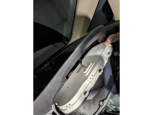 Pull it outwards and unplug the 40-pin white connector behind it to completely remove it.