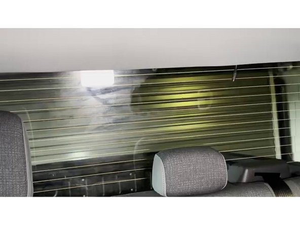 Clean the rear window mounting area thoroughly using an alcohol wipe. Allow the alcohol to fully evaporate before mounting the camera. This ensures a strong adhesive bond.