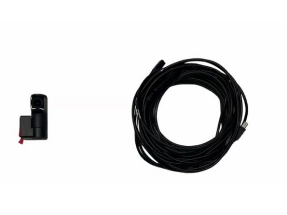 The camera uses an industrial-grade adhesive mounting system and connects to the GO Focus Plus via a 5-meter (16 ft) Mini-USB cable. No extension cables are available for this model.