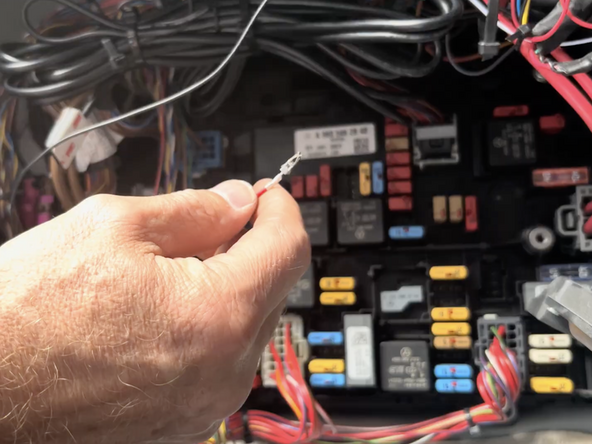 Connect the prepared HRN-CW03K3 harness to the vehicles fuse panel.