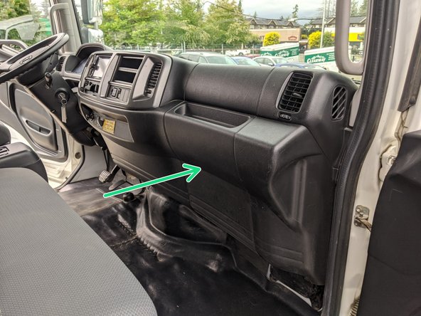 Remove the lower passenger-side dash panel. It is held in place by clips only.