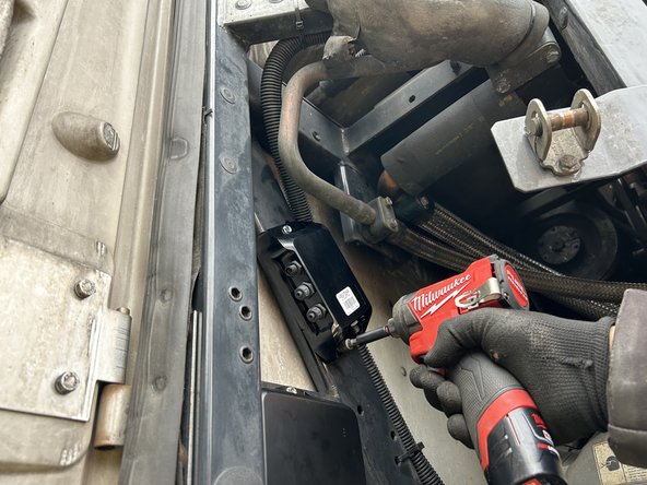 Use extreme caution when drilling holes in the refrigeration unit. Before drilling, check behind the mounting location to ensure the area is clear of any obstructions or electrical wires/components. Drilling into electrical wiring or refrigerant lines poses a fire risk.