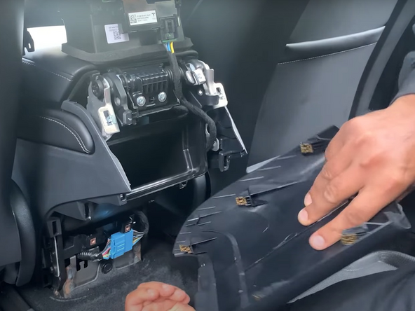 Remove the panel under the air vent using the same method.