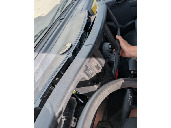 Moving left to right, be gentle to avoid damaging the dash cover to remove it.