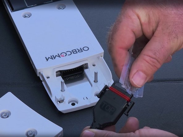 Reinstall the harness connector that was removed earlier and apply the supplied dielectric grease into the female contacts of the connector.