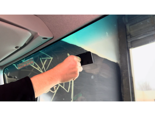 Press the mounting bracket for an additional 30 seconds to ensure it is firmly in place.