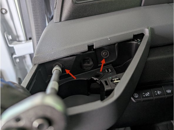 Use a T20 TORX screwdriver to remove the two screws as shown.