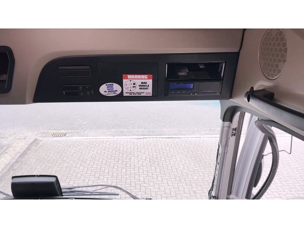 Locate the Thacograph in the cab of the vehicle.