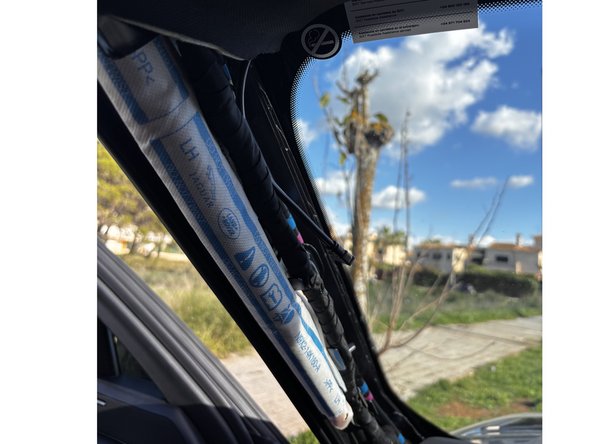 Remove the covers on the A-pillar so you can route the cable underneath.