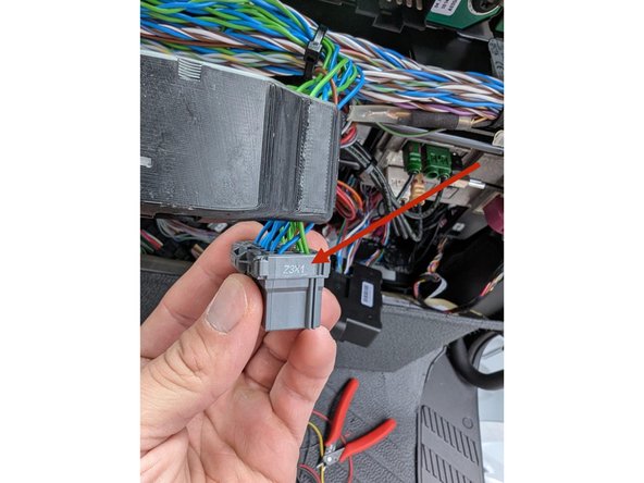 Returning to the inside of the Truck’s interior, Locate the gray connector, labeled Z3X1, in the top center of the fuse panel.