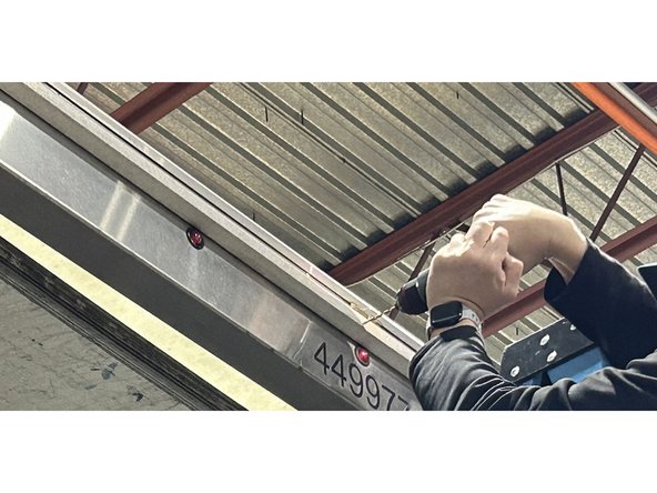 Mount the rear auxiliary camera at the top-centre of the vehicle’s rear wall or above the rear doors, using the included bracket.