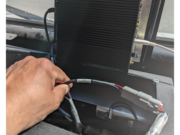 Locate deutsch connector labeled P95 under dash (below TCU) and plug into the custom Motiv harness deutsch connector.
