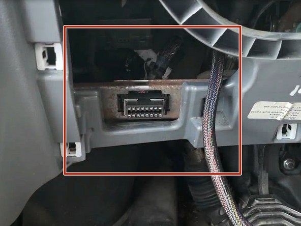 Install the prepared T-harness connector from [invalid guide link] into the OEM location