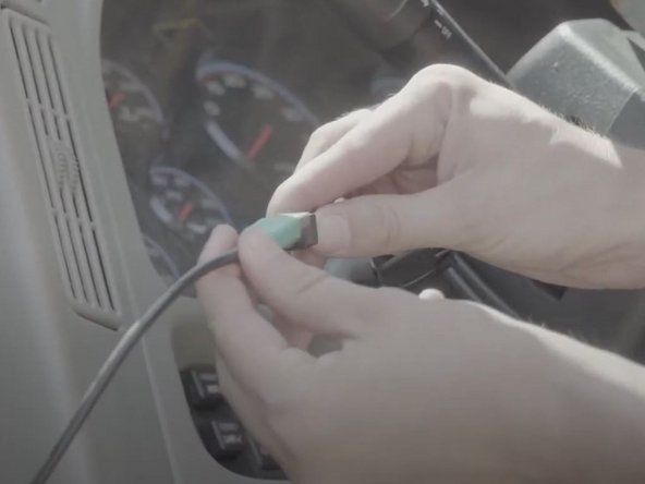 Locate the end of the cable from the tablet and connect it to the  IOX-USB.