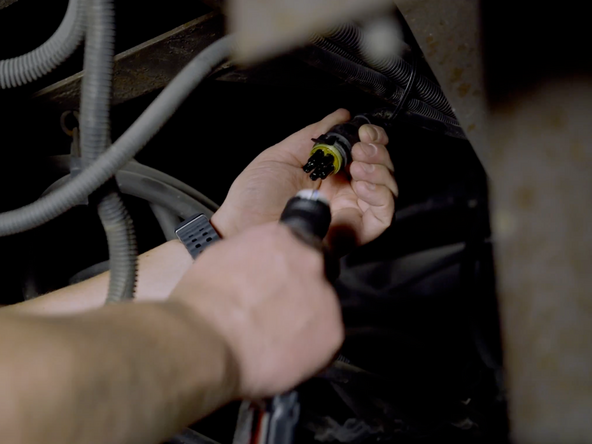 Connect the female connector from the AssetTrac harness to the male connector on the trailer's 5-way ABS harness.