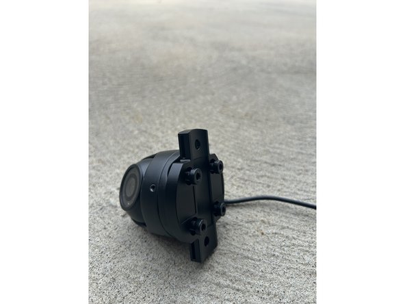Mount the universal mounting bracket to the TVI camera using the 4 included fasteners.