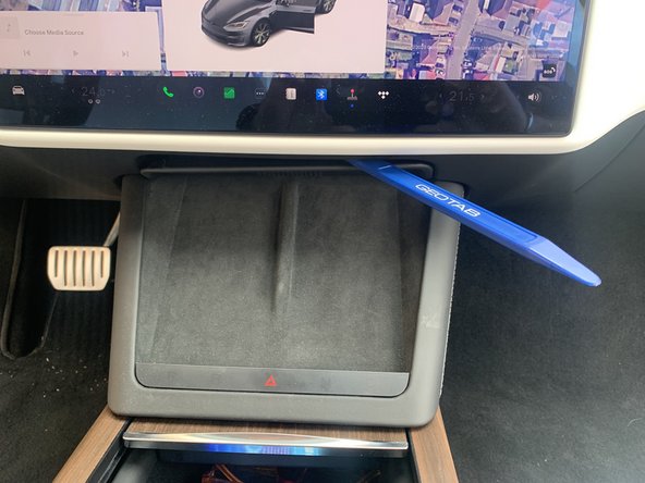 It may be easier to work from the passenger side of the vehicle.