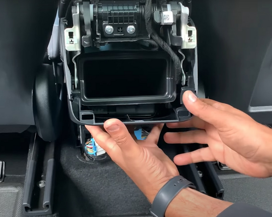 Reinstall the removed panels in reverse order, starting with the center panel.