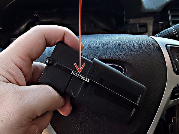 Secure the device to the harness using the included black serialized cable tie.