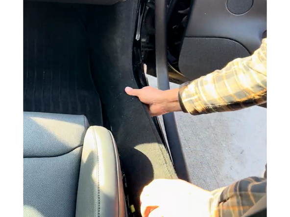 Remove the sill/kick panel to the right of the passenger seat by pulling up firmly to release the clips.