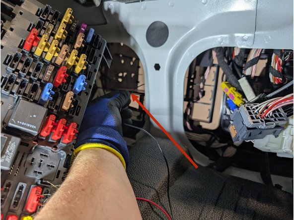 Guide the HRN-CW03K3-A harness's Black wire through the designated opening.