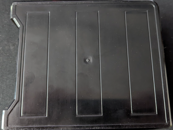 Prepare the IOX-KEYBOX for installation, and attach the provided dual lock adhesive tape to the bottom of the IOX-KEYBOX.