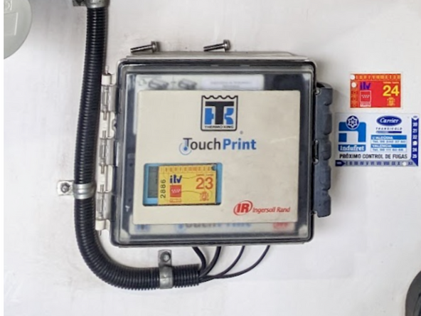 Mount the Thermograph back into its original location and close the compartment.