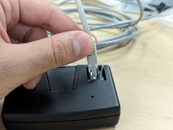 Connect the harness RJ45 male connector to the in-cab controller.