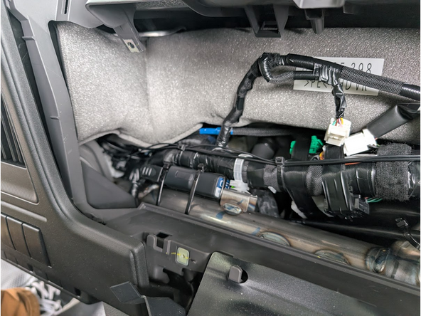 Feed the GO device portion of the harness up to the right-hand side of the space where the Instrument Cluster unit sits.