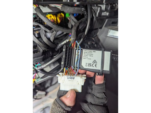 Open the clamp and insert both wires (Pin 6 (CAN Hi) - Light/Blue-White and Pin 14 (CAN Lo) - Light/Blue-Yellow) of the OBD-II port labelled “OBD2” into either of the device cavities.