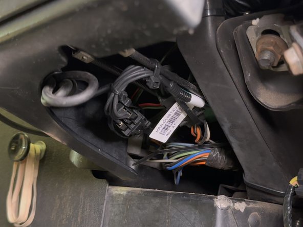 Ensure the harness does not obstruct the operation of the parking brake.