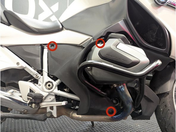 Remove the 3 x T25 screws using a screwdriver.