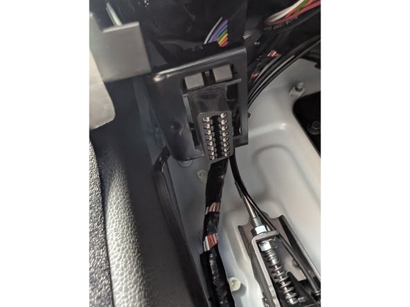 Clip short end of the HRN-GS16K22-A harness into place of the original vehicle port