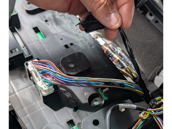 Remove any tape needed to expose more the the CAN wires creating enough room to connect IOX-CLAMP