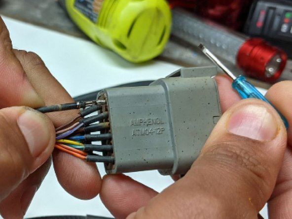 To re-pin, slide the pins back into their correct slots for both Connectors. Lightly tug on them to confirm they lock back in place