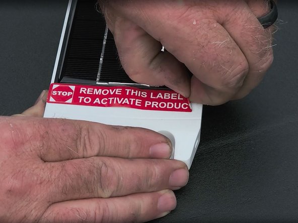 Begin by activating the asset tracker, removing the red label, and verifying LED activity. Once the LED turns solid blue followed by solid green, the unit is ready for installation.