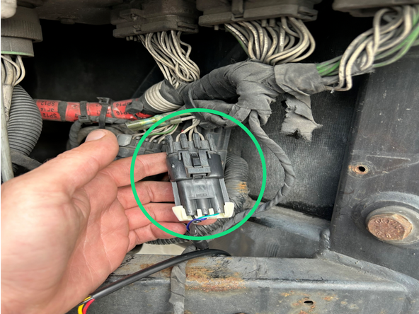 Connect the HRN-RCCCAADV harness to the Serial Port 3-pin connector located near the right compartment of the unit.
