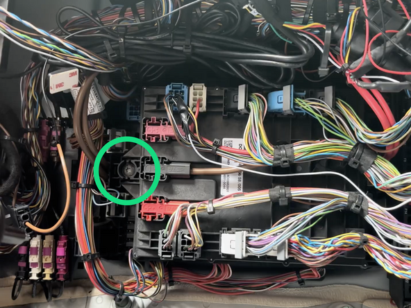 Pull the ASAM control module to the side to get access to the main fuse panel.