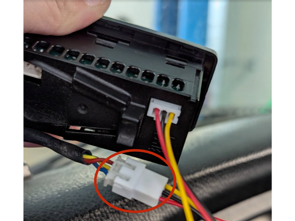 Connect the circular HRN-CCTKCSR connector to the in-cab controller.