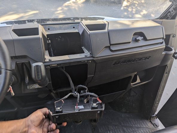 Familiarize yourself with the asset and remove panels as needed to access the power point connection and choose an appropriate mounting location.